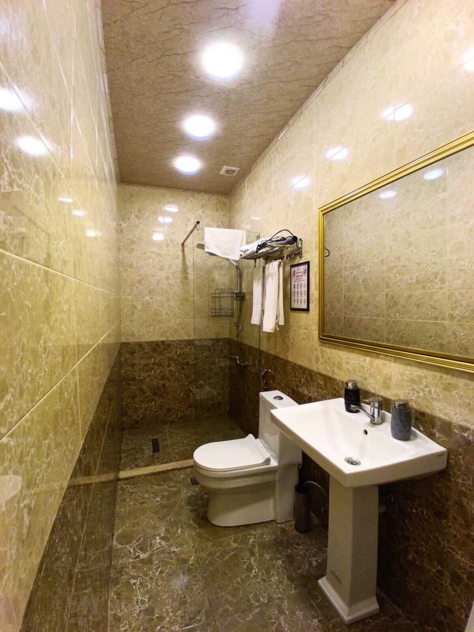 Hair dryer, slippers, towels, soap
