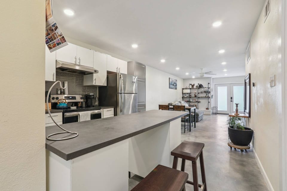 Open concept kitchen, dining and living room