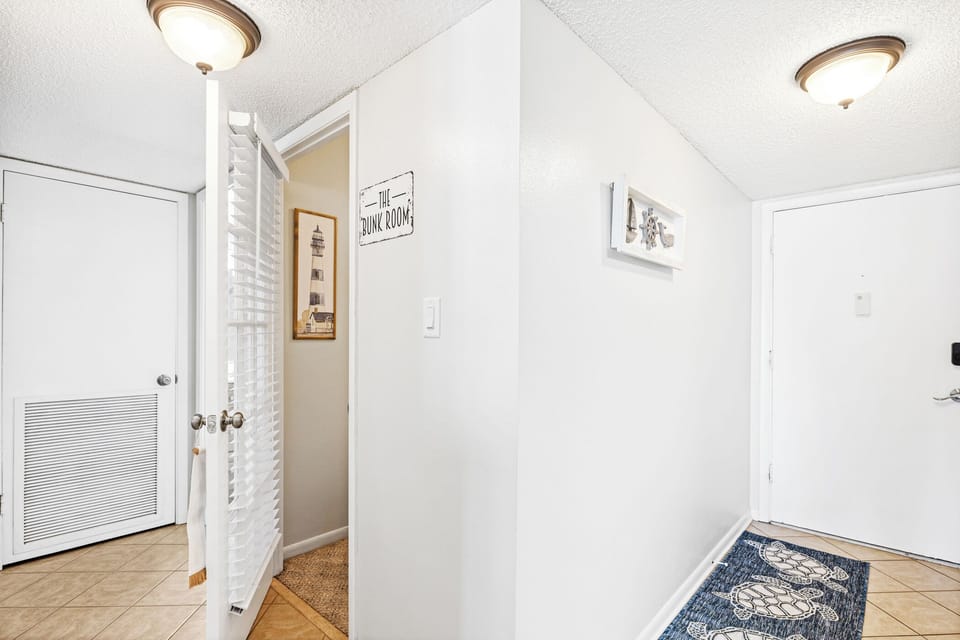 Part of the unit hallway and entrance.