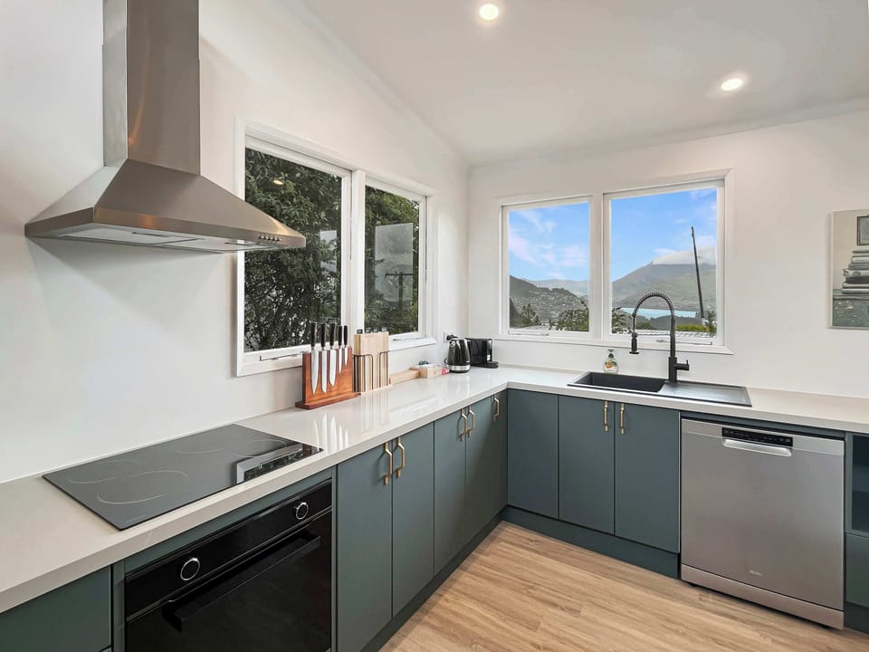 Modern kitchen with quality appliances and scenic views
