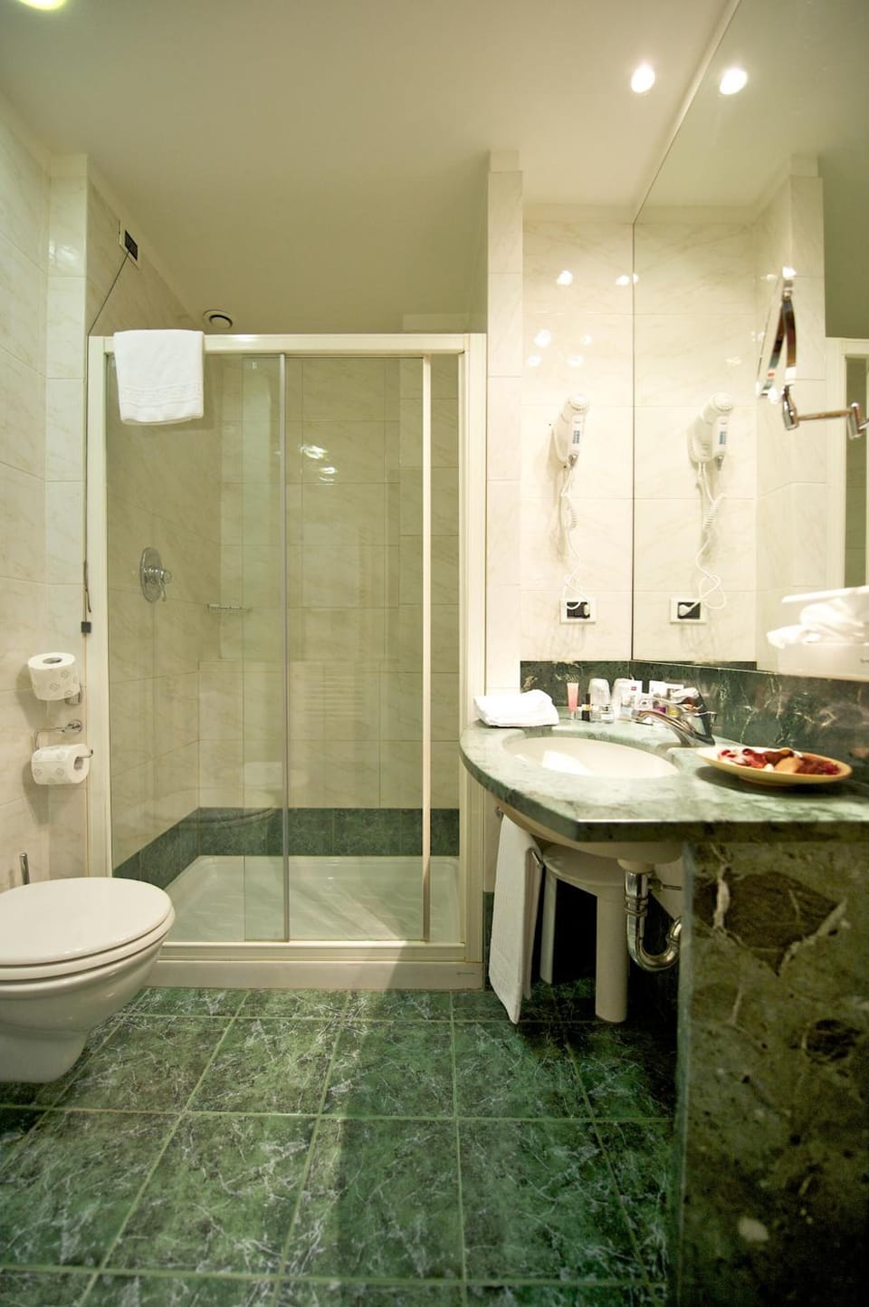 Shower, eco-friendly toiletries, hair dryer, bathrobes