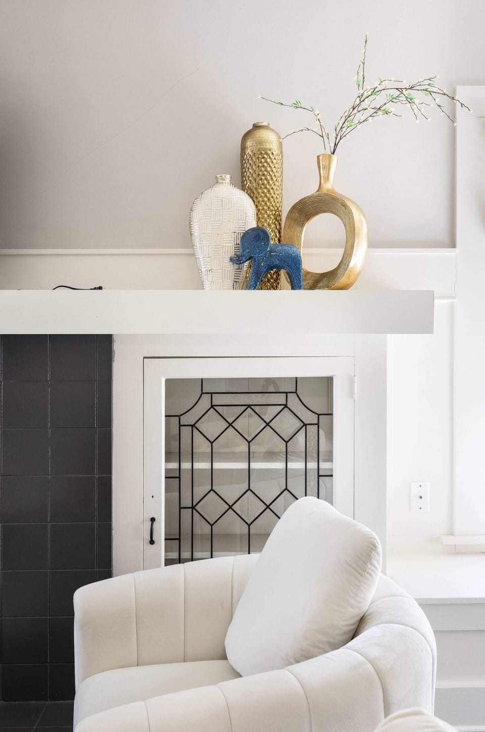 A stylish and modern living area with elegant decor, showcasing a blend of warmth and sophistication, perfect for unwinding.