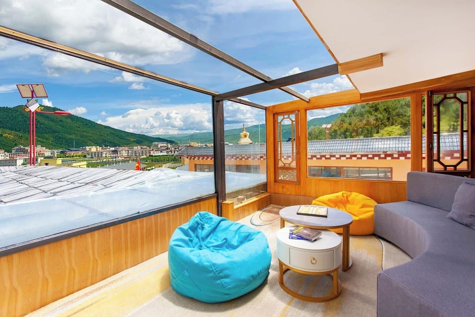Junior Suite, Balcony, Garden View | Living room | LCD TV