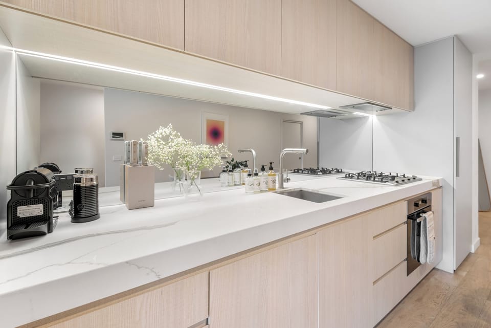 Fully equipped kitchen with Miele stove top and oven. Utensils fully stocked