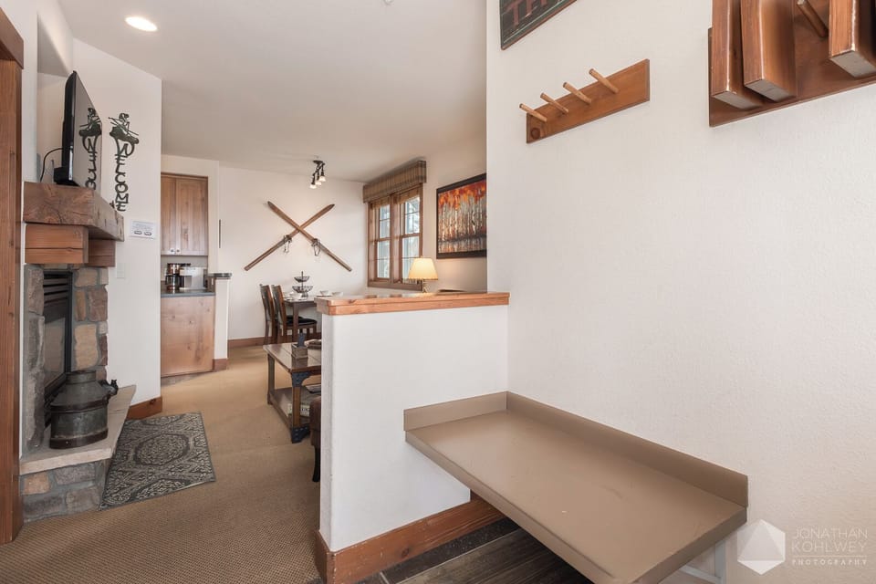 The entry way has convenient gear storage space for your boots and skis