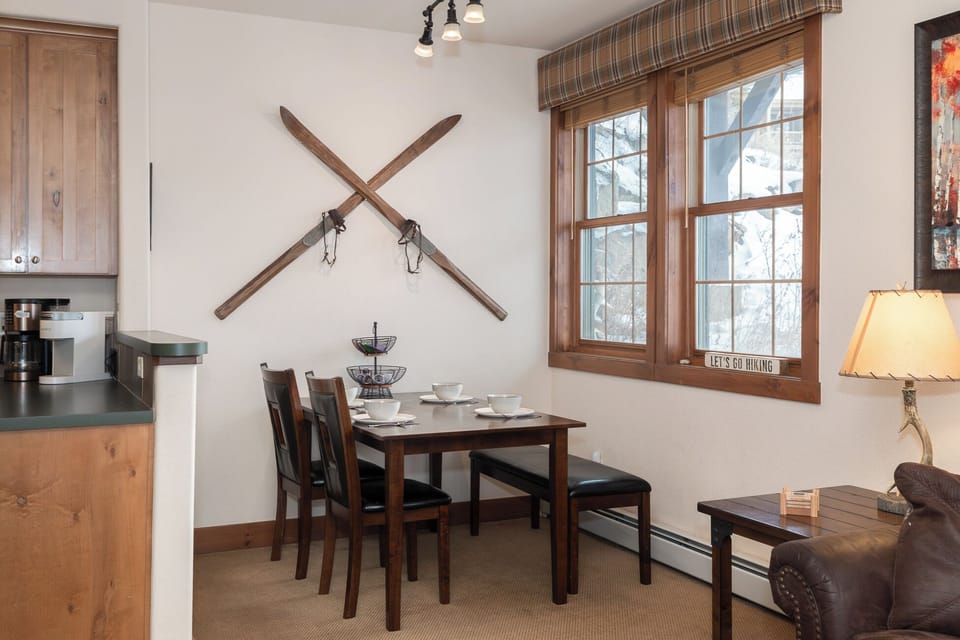 Enjoy meals and views of the slopes from our dining table (seats 4)