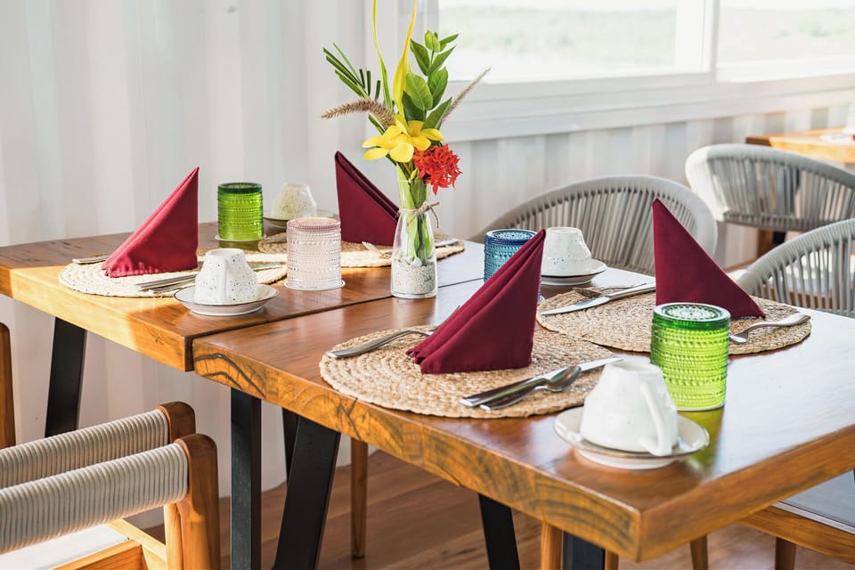 Savor a beautifully set table before a sunset dinner.