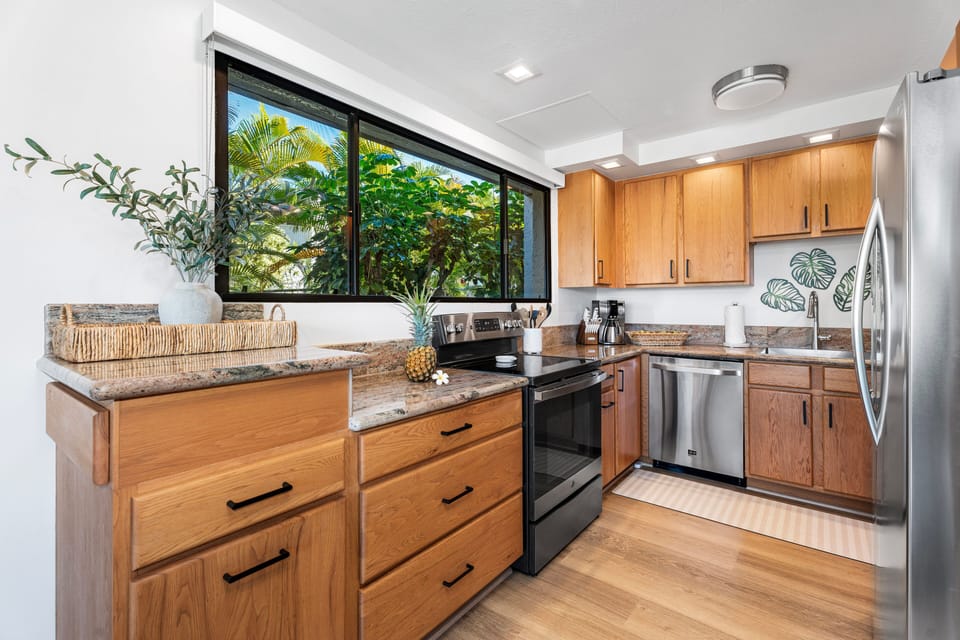 End Unit offers expansive kitchen / dining area windows affording island breezes and natural lighting.