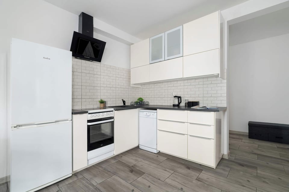 The fully equipped kitchenette includes everything you need for a home-cooked meal.