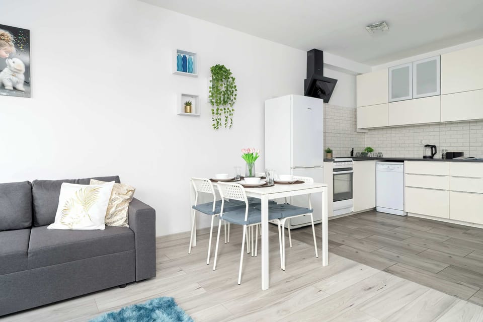 Enjoy your favorite shows on the flat-screen television in the elegant living area.