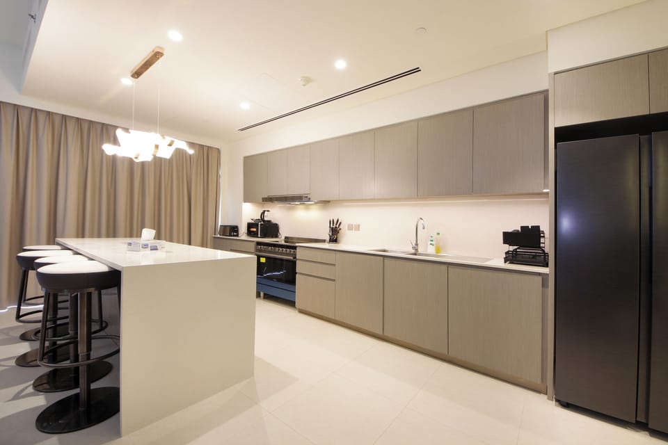 Deluxe Apartment, Balcony, City View | Private kitchen | Coffee/tea maker, electric kettle