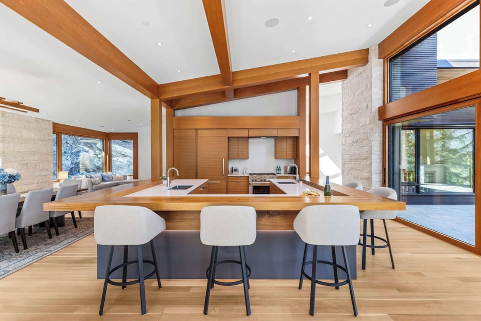 Stylish breakfast bar w/ wood accents, perfect for morning coffee or casual bites.