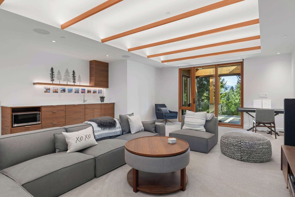 Spacious media room on the lower level, perfect for movie nights and downtime.