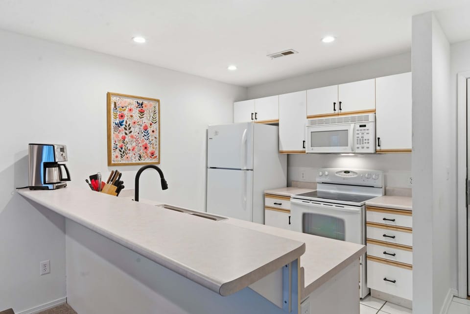 The open kitchen is well equipped for an unforgettable getaway​