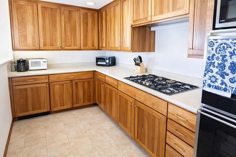 Bright, fully equipped kitchen with ocean views