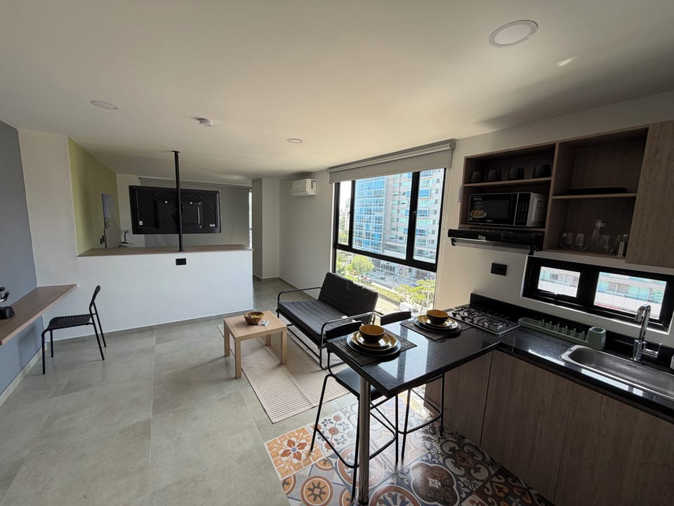 Basic Studio, City View | Living area | 32-inch Smart TV with digital channels