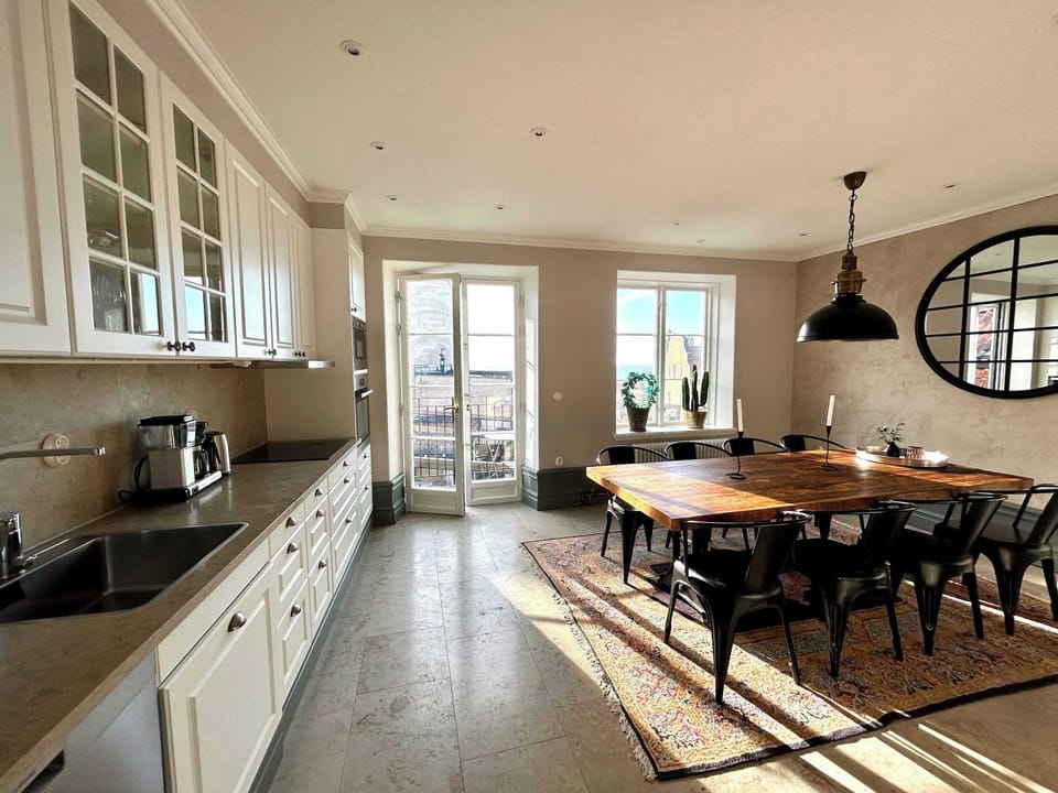The kitchen is fully equipped with all essentials you will need for a home cooked meal. There is a stove, oven, dishwasher, kettle, fridge, freezer, microwave, coffee maker and silver ware.