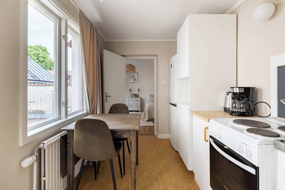 Overview of the kitchen and dining table .