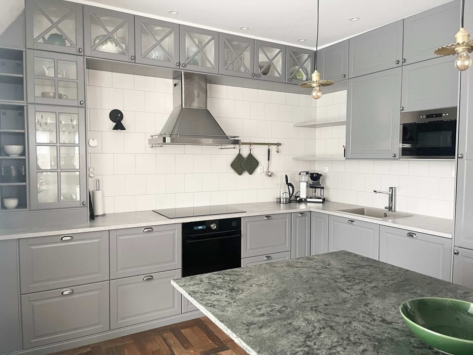 Fully equipped kitchen with all essentials you will need for a home cooked meal. There is a stove, oven, fridge, freezer, microwave, dishwasher, wine fridge, coffee maker and kettle.
