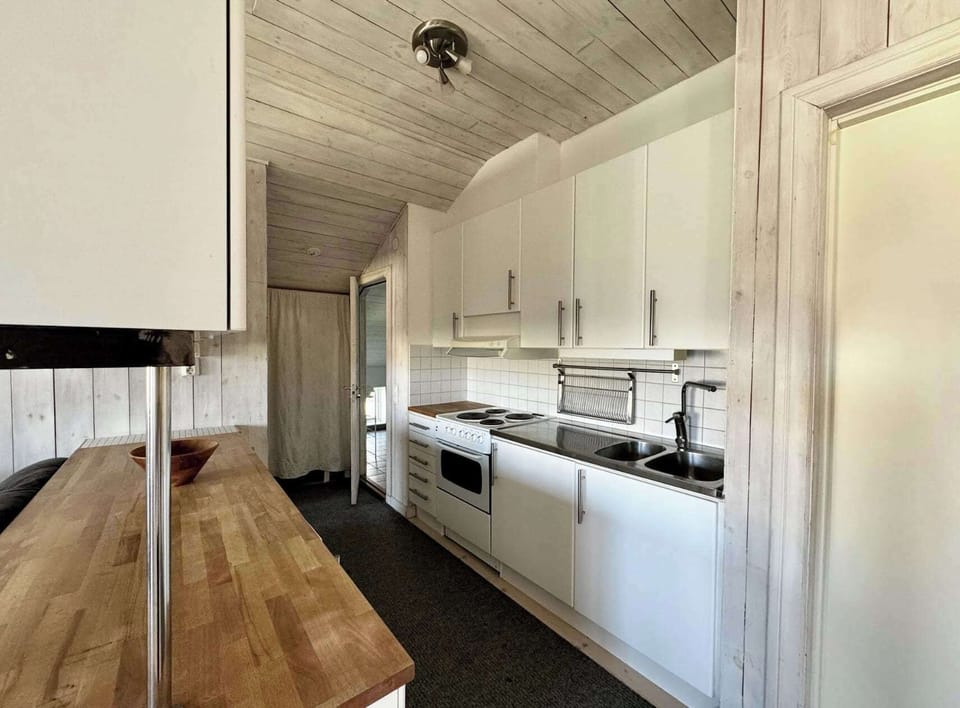 Fully equipped kitchen with all essentials one needs to prepare own food.