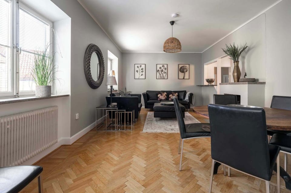 The spacious living room with modern Scandinavian design.