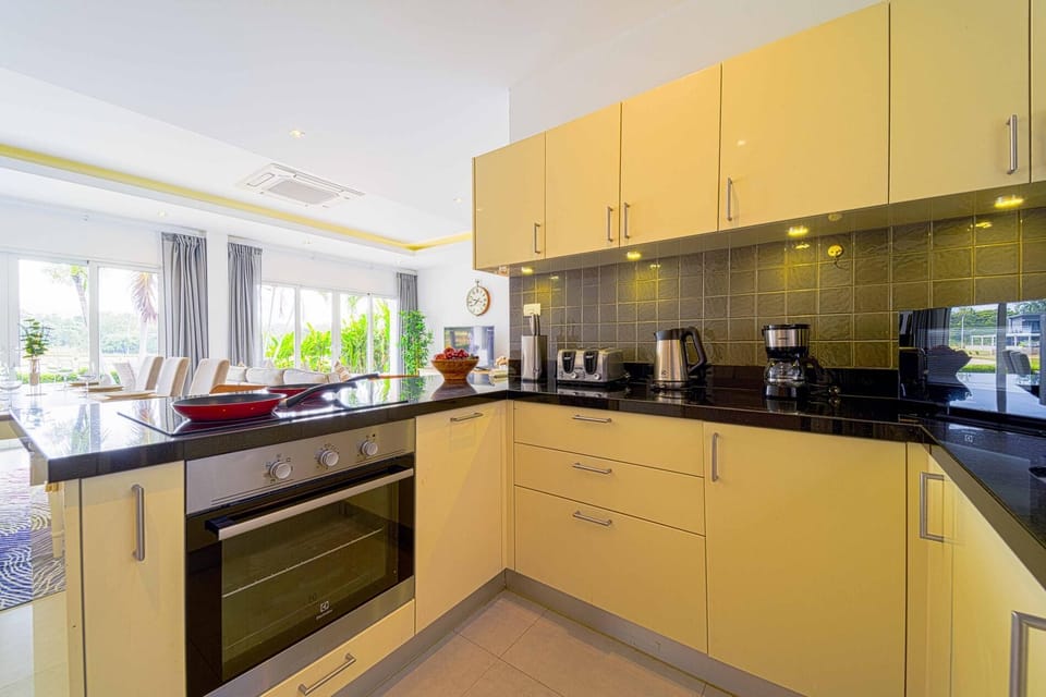 Villa, 3 Bedrooms, Patio, Garden View | Private kitchen | Full-size fridge, microwave, stovetop, dishwasher