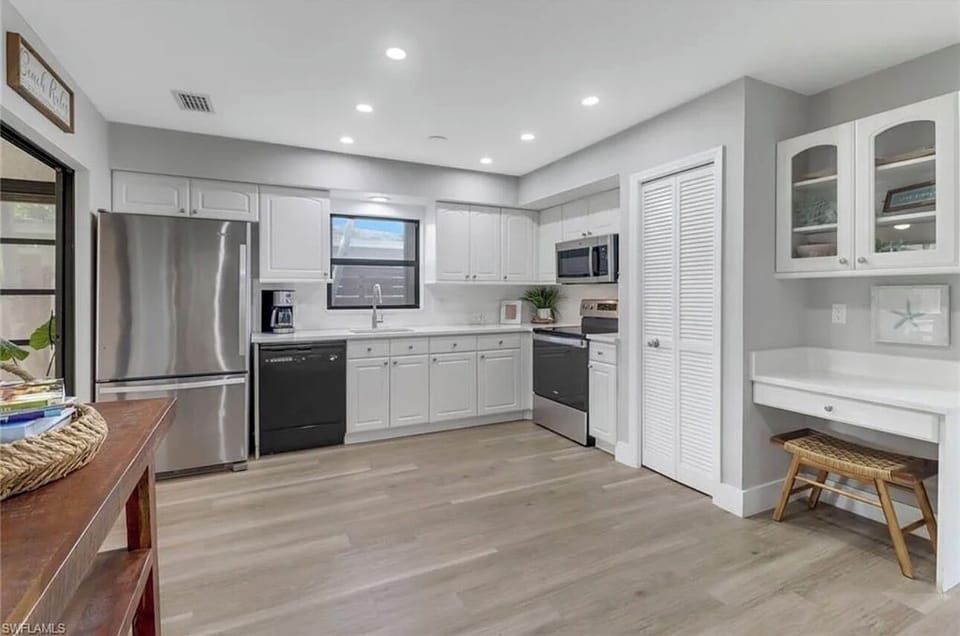 large and clean updated kitchen with workspace