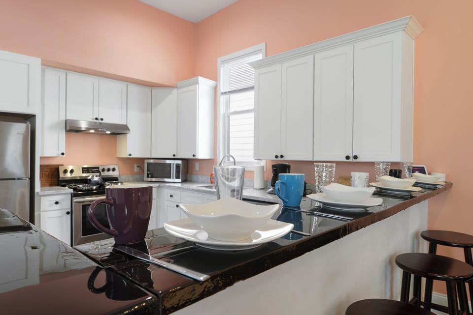 Bar Top- set for 4, great for coffee or meals, access to kitchen and living