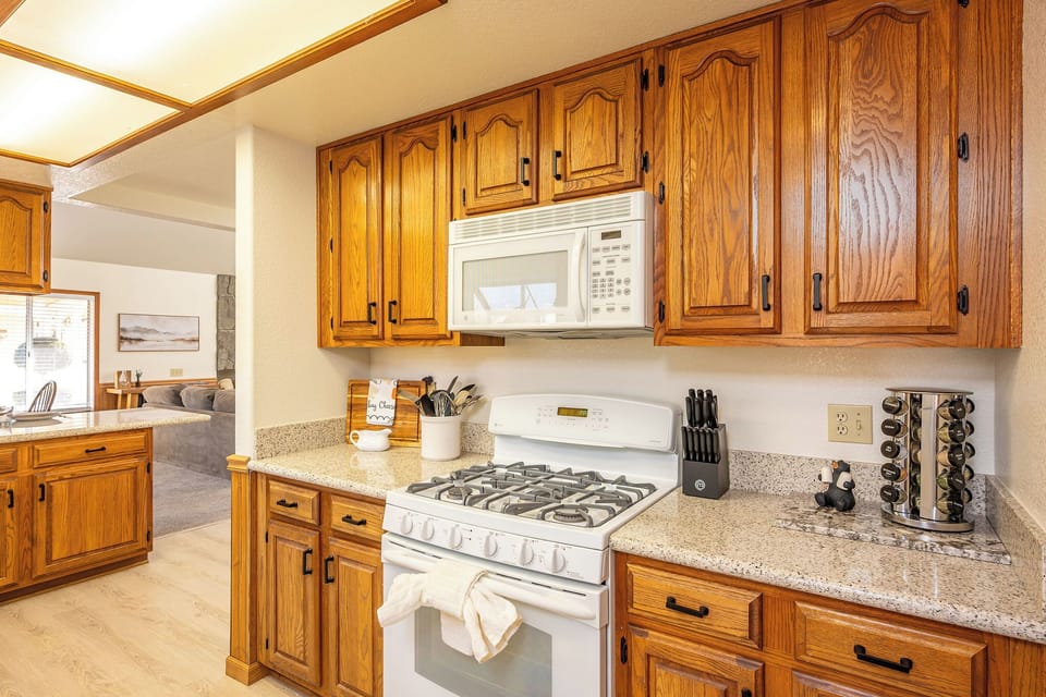 Let's get cookin'!  This fully equipped kitchen features all the essentials for a comfortable stay.