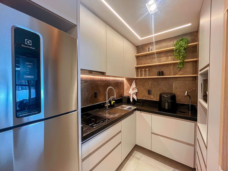 Luxury Apartment | Private kitchen | Fridge, microwave, stovetop, cookware/dishes/utensils