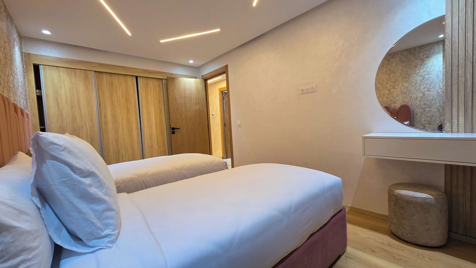 Grand Apartment, 3 Bedrooms, Balcony | In-room safe, iron/ironing board, free WiFi