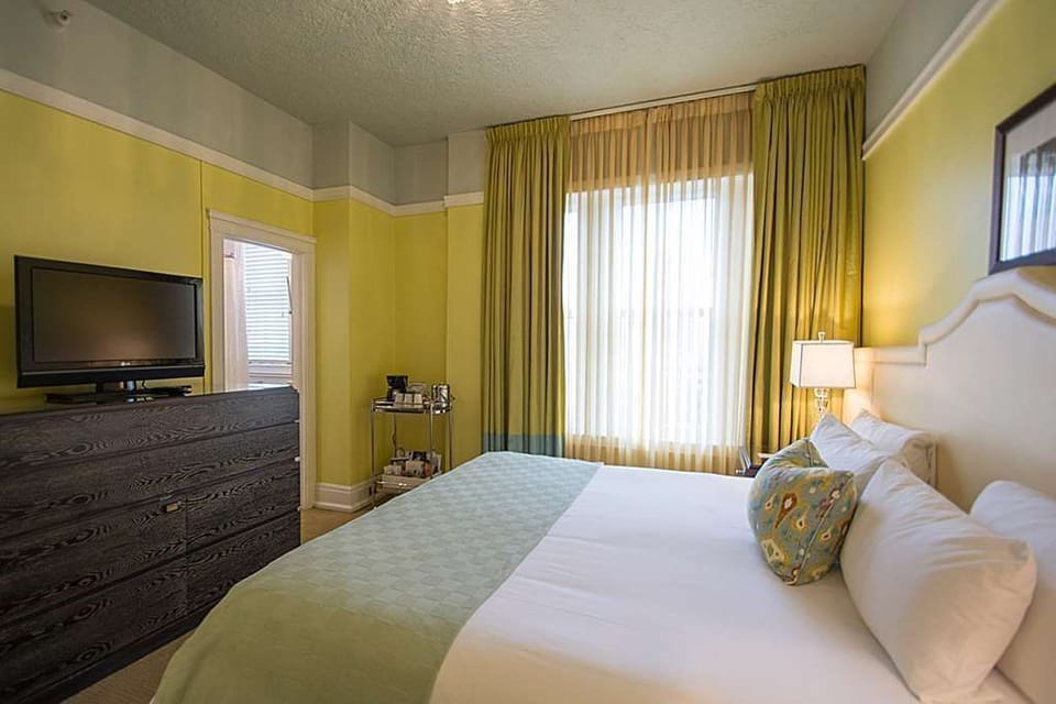 Our inviting king room features modern amenities, comfortable bedding, and a tranquil atmosphere for a restful stay.