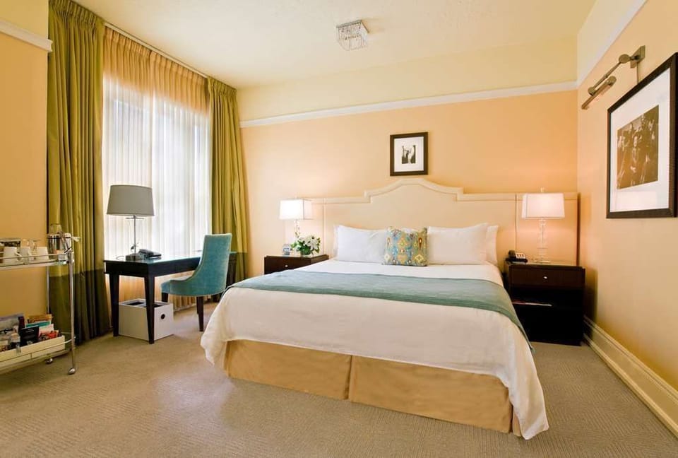 Spacious king room designed for ultimate relaxation, featuring stylish furnishings, cozy bedding, and a serene ambiance.