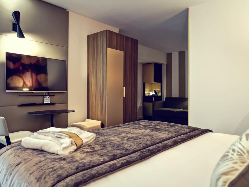 Premium bedding, memory foam beds, minibar, in-room safe