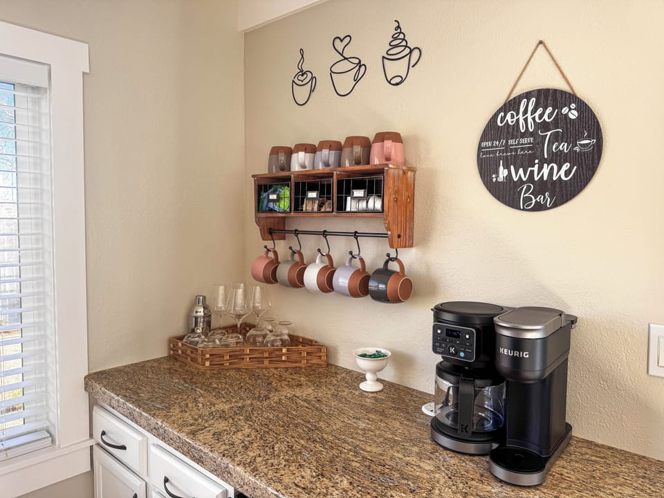 Fully stocked coffee and wine bar with Keurig K-Duo coffee maker