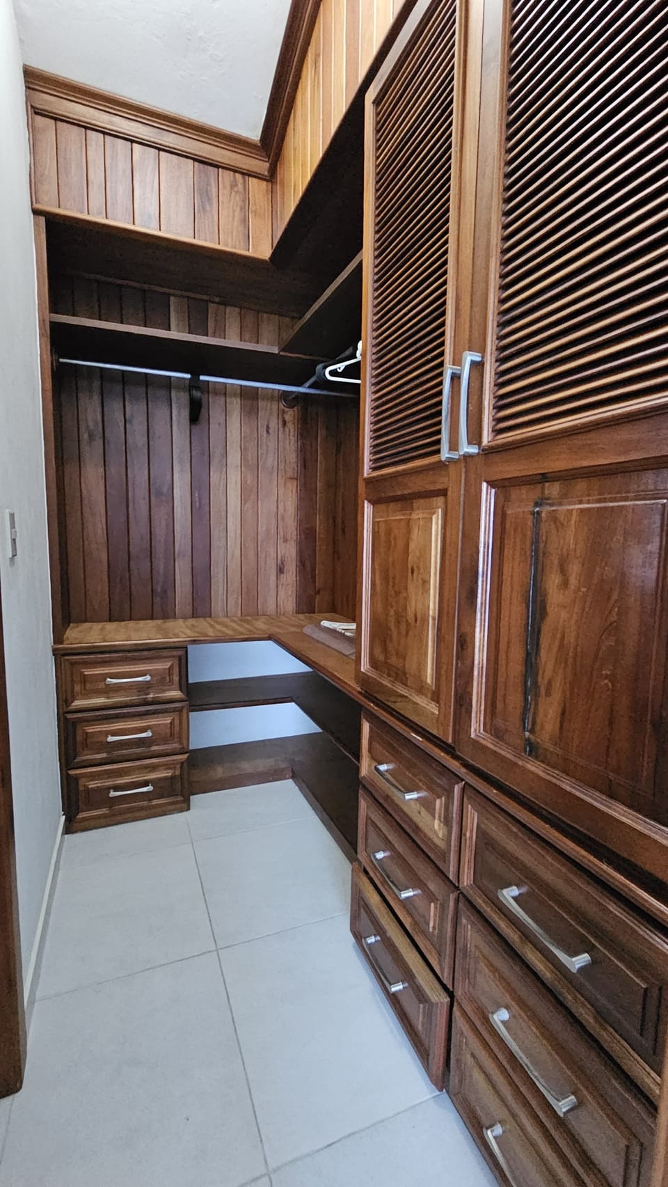 Walk-in closet from bedroom 1
