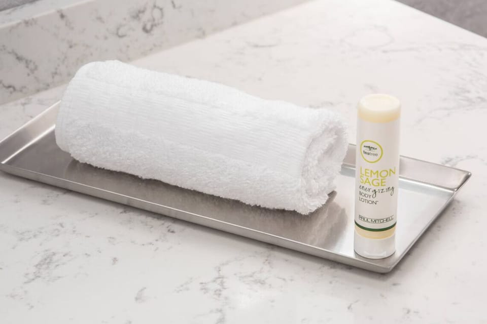 Indulge in fresh towels and soothing body lotion after bathing.