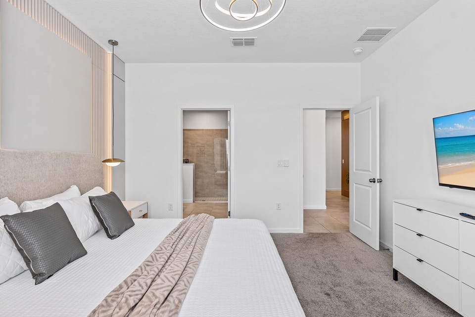 Enjoy the master bedroom's ensuite bathroom with a walk-in shower.
