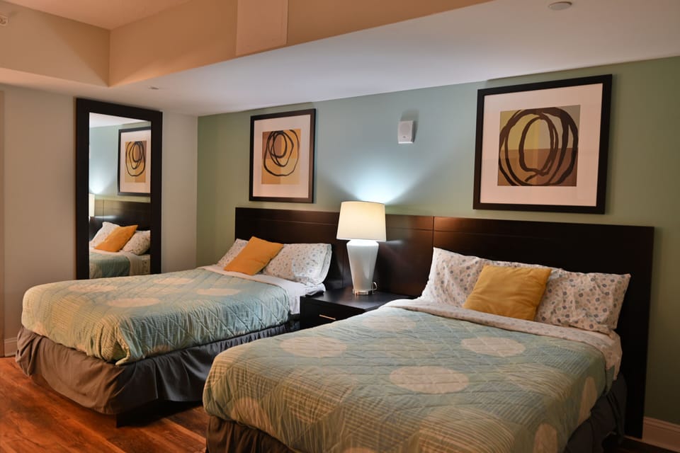 Spacious bedroom with two full beds