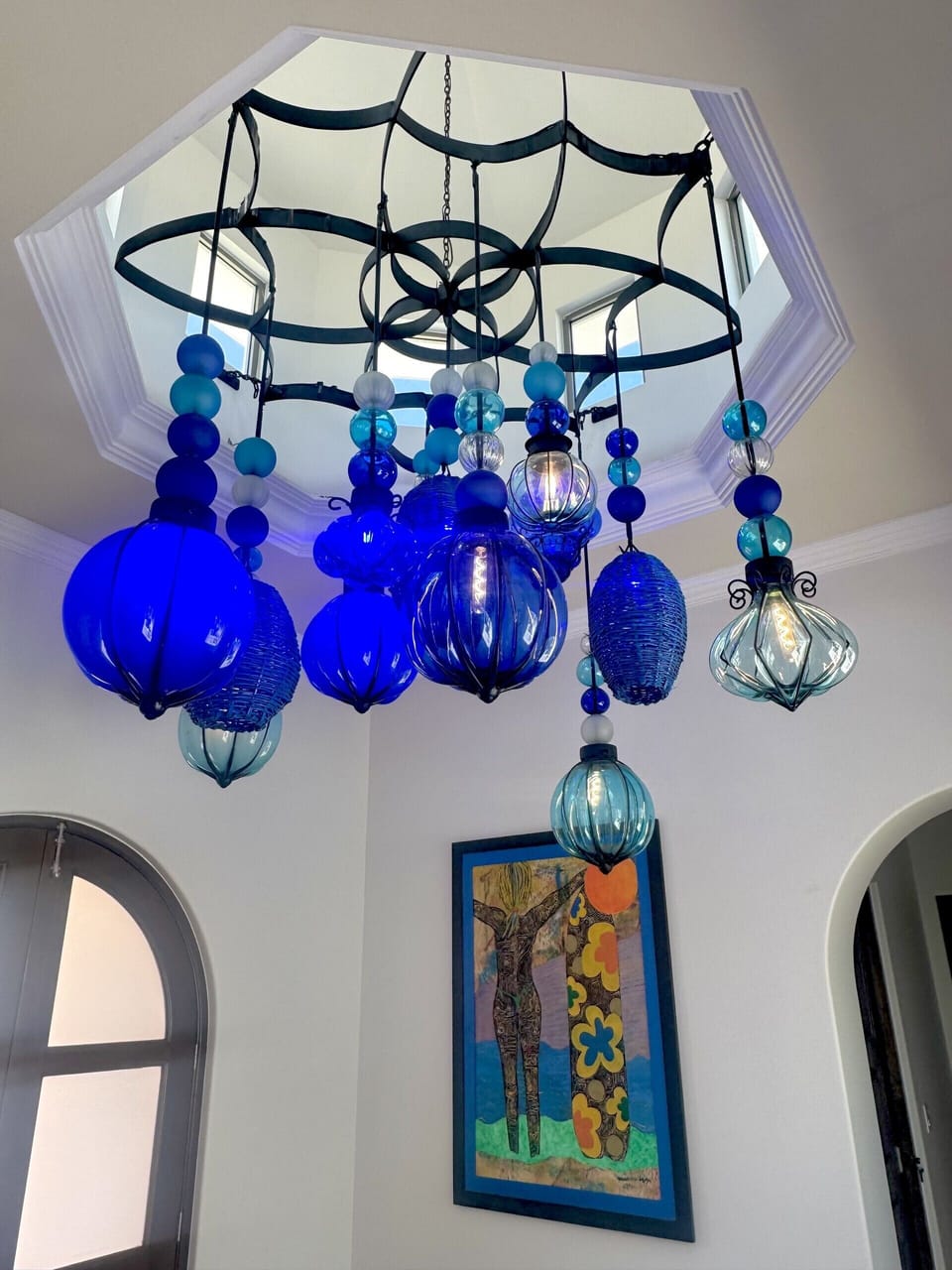 Custom chandelier artwork, WOW'ing you just as you walk in the door.
