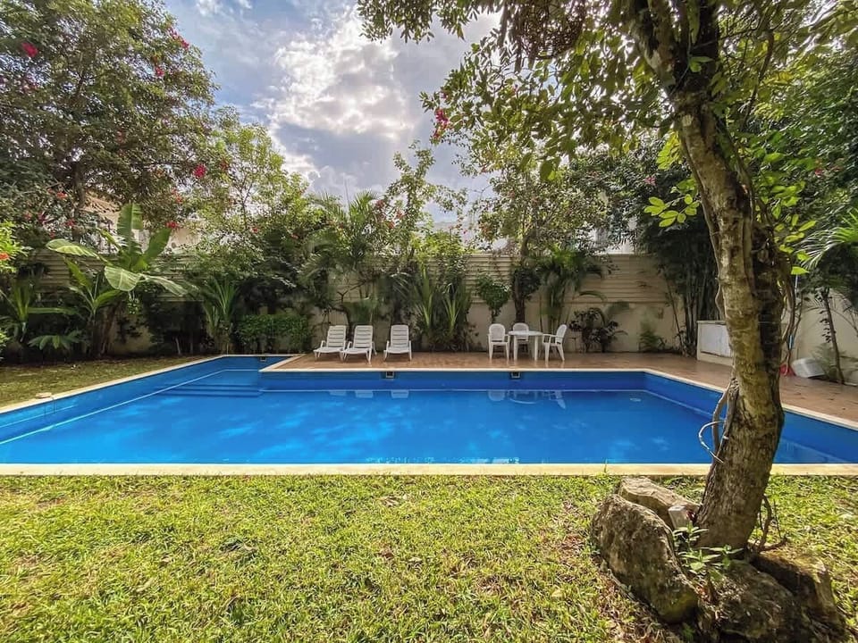 Garden area with shared communal pool