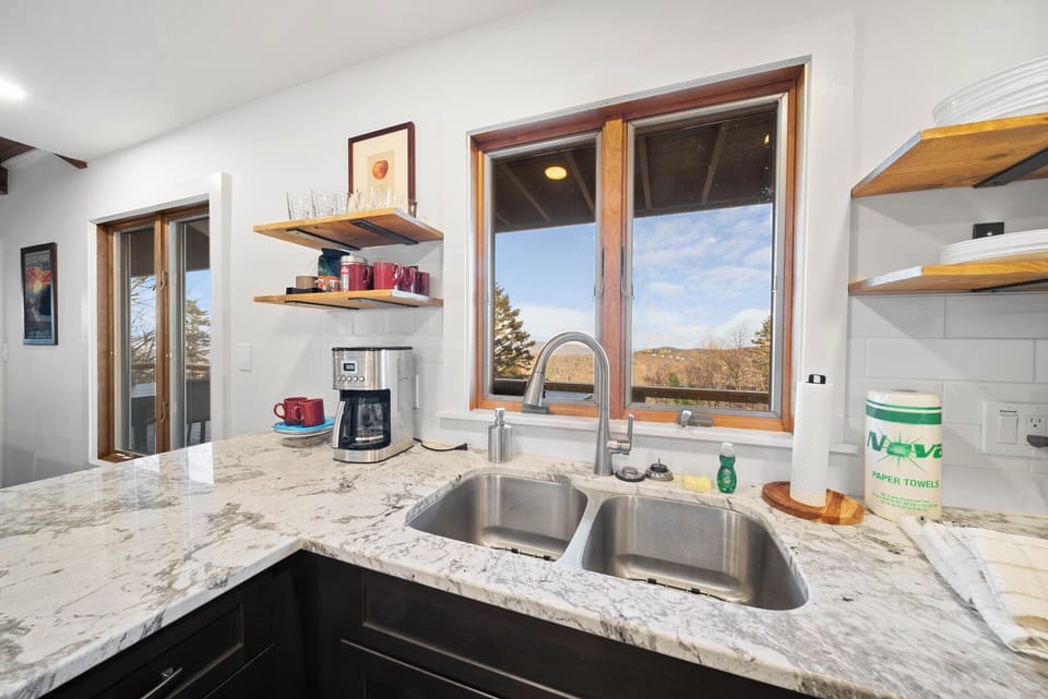 Picture Perfect View from the Kitchen Window with a Double Basin Sink