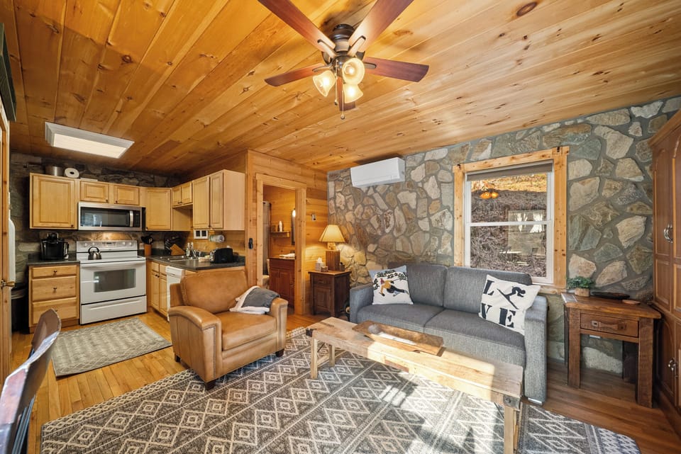Main Floor Living Space with a Beautiful Stone Accent Wall