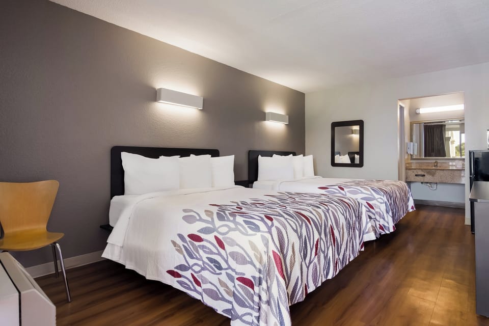 Desk, blackout drapes, WiFi (free), bed sheets