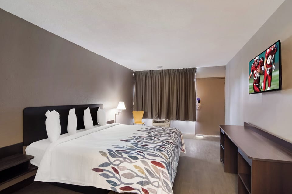 Desk, blackout drapes, WiFi (free), bed sheets