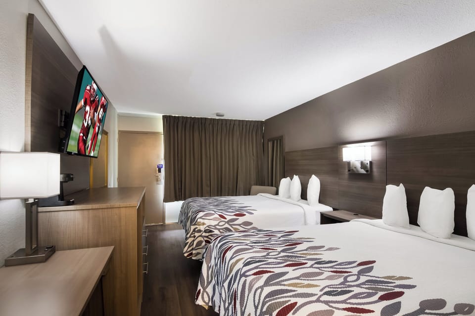 Desk, blackout drapes, WiFi (free), bed sheets
