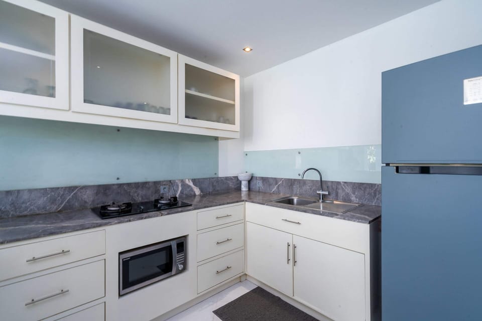 Basic Villa | Private kitchen | Fridge, microwave, stovetop, toaster