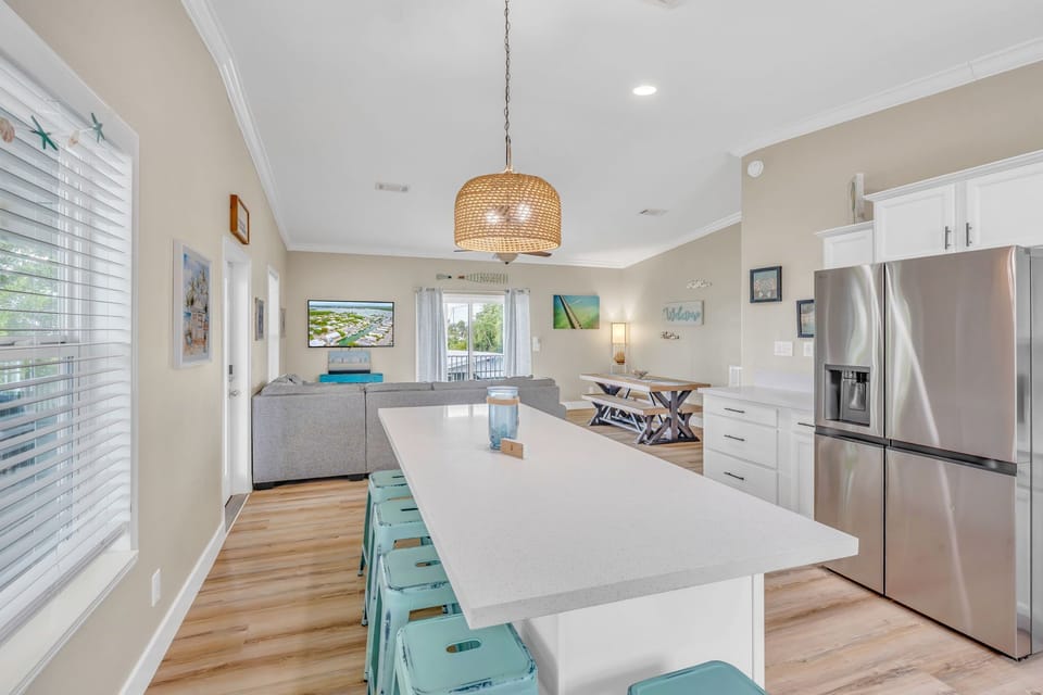 Large kitchen designed for extended stays, featuring full amenities and views of the canal.