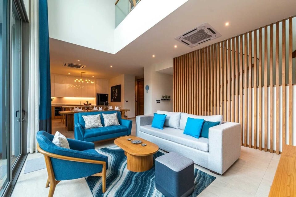 Living Room
A bright and open space ideal for relaxing, dining, or spending time together.

• Spacious open-plan living area
• Comfortable sofa seating
• Air-conditioning
• Smart TV 
• High-speed Wi-Fi throughout the villa