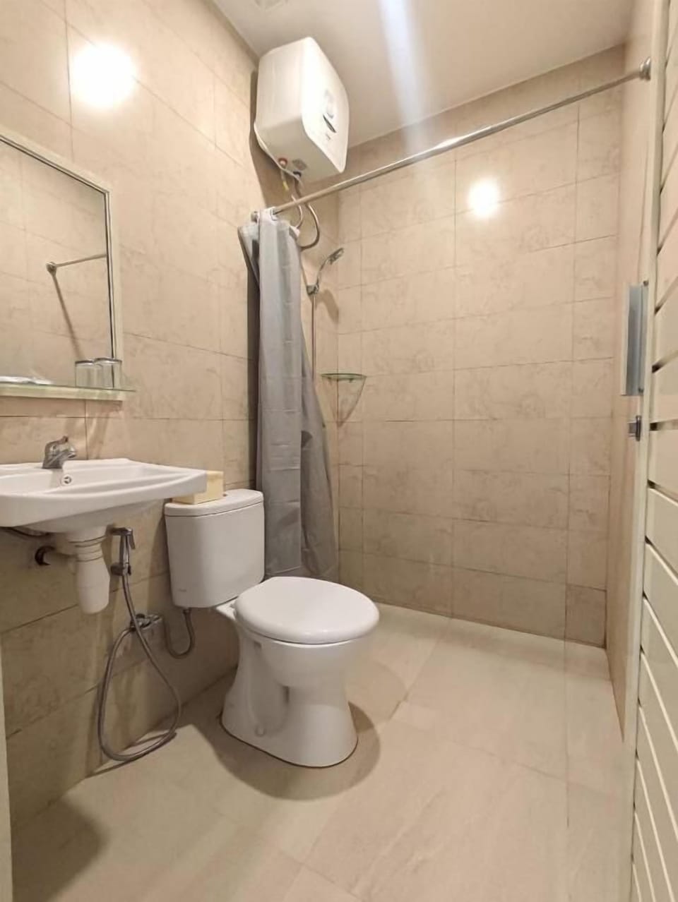 Shower, free toiletries, hair dryer (on request), slippers